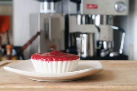 Panacota with raspberry jam on a saucer, shallow depth of field.の写真素材