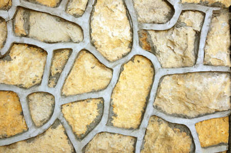Decorative stone wall pattern of different size, background.の写真素材