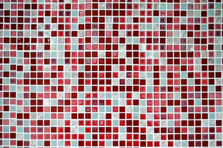 Ceramic mosaic tiles in red tones.