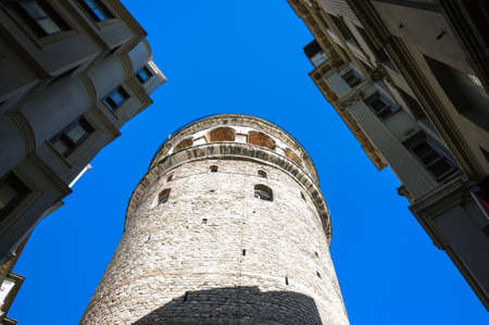 Bottom view of Galata tower against blue sky, Istanbul.の写真素材