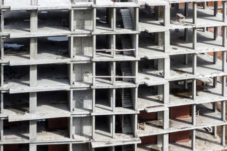 Frame of the building under construction, background.
