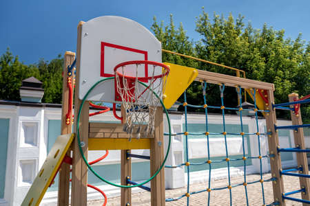 Red basketball Hoop on the Playground, selective focus.