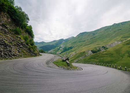 Sharp turn on mountain road, serpentine on the georgian military road.
