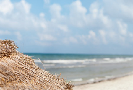 beach umbrella on the background of the sea.の写真素材