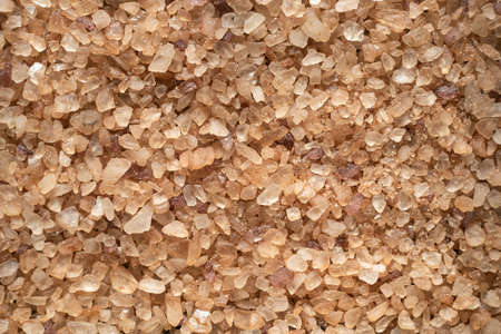 Close up texture of brown salt crystals, background.