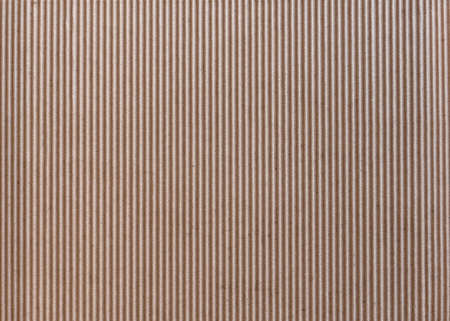 Texture of vertically corrugated brown cardboard, background.の写真素材