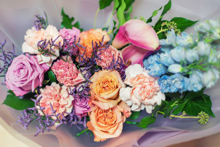 Beautiful bouquet of mixed fresh flowers, background.の写真素材