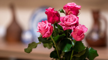 Bouquet of five beautiful purple roses, background.の写真素材