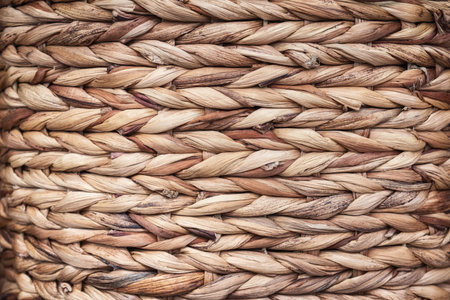 Fragment of a wicker basket, background.