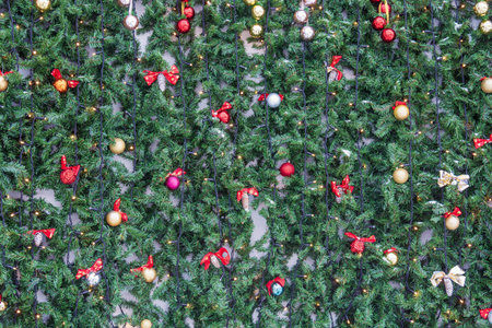 Christmas installation, fir branches with decorations, background.