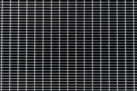 Rectangular grey metal grate, background.の写真素材