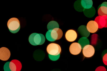 christmas lights; blurred coloured lights at nightの写真素材