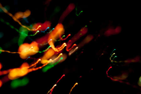 christmas lights; blurred coloured lights at nightの写真素材