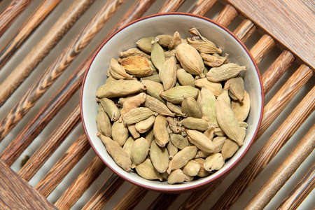 cardamom in a cup for tea ceremonyの写真素材