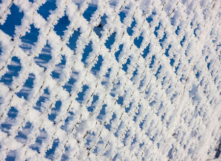 Metal mesh in the hoarfrost, texture, background