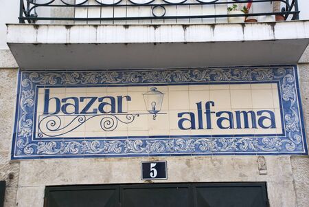 Typical portugese decoration on houses made of tiles called azulejos naming Alfama, Lisbon's old townの写真素材