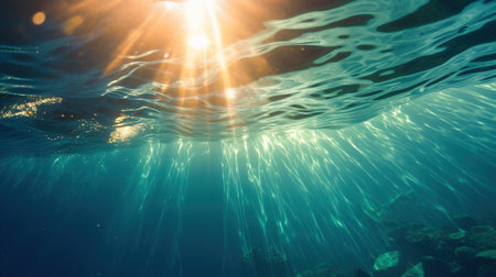 Generative AI, Dark blue ocean surface seen from underwater with sun lightの素材