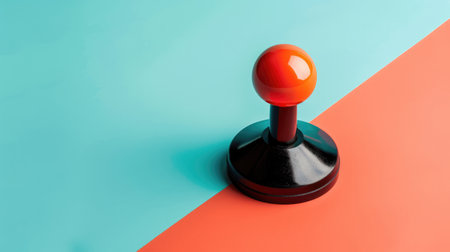 Retro style arcade joystick or game controller, minimalist design. Classic video game consoles from the 80s, symbolizing the nostalgia for arcade gaming and the golden age of video gamesの素材