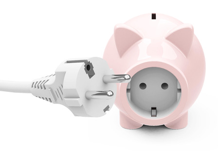  piggy bank with power socketの写真素材