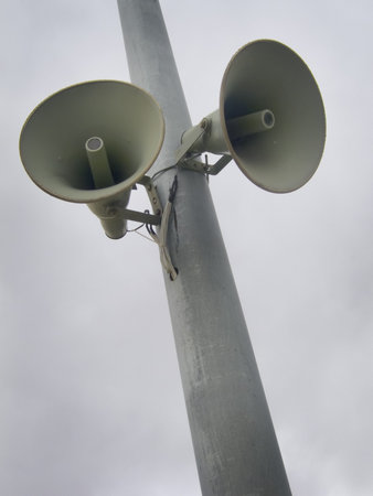 Two loud announcement speakers