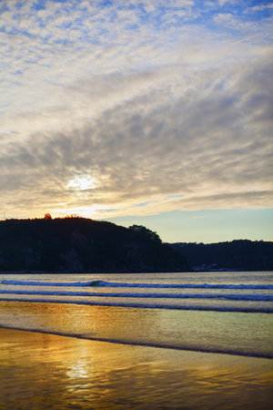 Vibrant sunset on the Cantabrian Coast of Spain.の写真素材