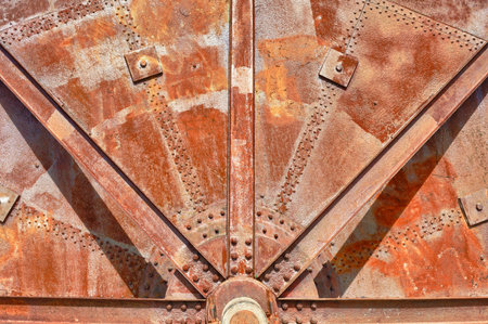 Old abandoned industrial machinery wheel detail for Background or Texture.の写真素材