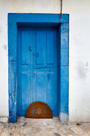 Antique beautiful door of a house in the North Spainの写真素材