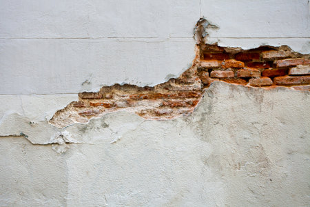 Detail of Old Cracked Brick Wall. Macro shot.の写真素材