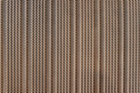 Perforated metal macro shot for background or textureの写真素材