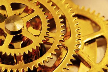 Golden gears - Macro detail of an old clockの写真素材