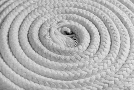 White rope roll with some plaited white ropes.の写真素材