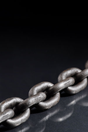 Old weathered industrial steel chainの写真素材