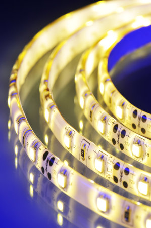 macro detail of a warmwhite LED-stripe in colored spotlight