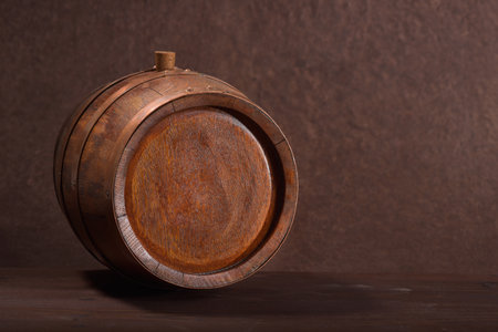 old wood barrel with copper rings and plugの写真素材