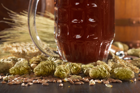 beer glass, beer barrels, hops, wheat, grain, barley and malt