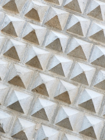 Patterned grey wall decorated with sgraffito ornamentation in Segovia, Spainの写真素材