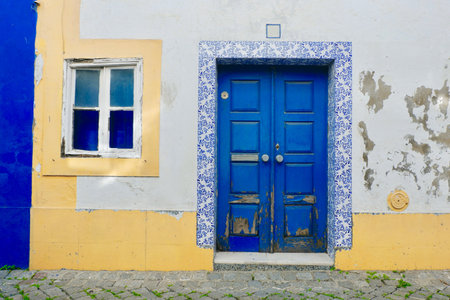 Shabby entrance to authentic vintage house in Arronches, rural area of Serra de Sao Mamede, Portalegre district, Portugalの写真素材