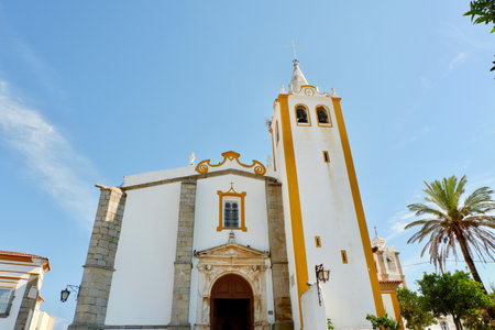 Vibrant church painted in traditional colours in Arronches, Serra de Sao Mamede, Portalegre district, Portugalの写真素材