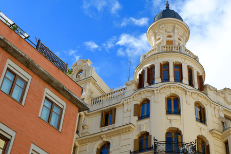 Classy buildings in the Central district of Madrid, Spain. Rounded architectural shapes and art deco detailsの写真素材
