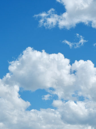 Fluffy cloudscape on blue sky. Concept of freedom and peace.の写真素材