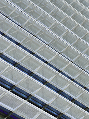 White metal lines on building. Urban geomentrical perspective.