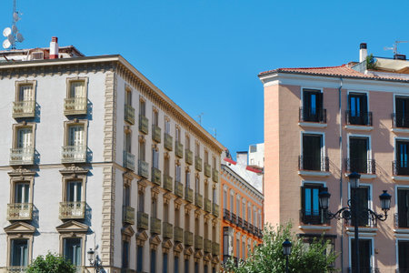 Classy houses in pastel colours in the central district of Madrid, Spain.の写真素材