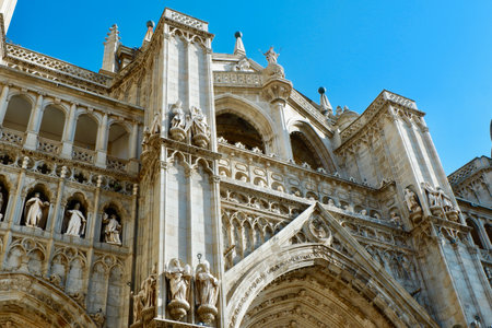 Looking up on the Primatial Cathedral of Saint Mary in Toledo, Spain. Filigree details of the top.の写真素材