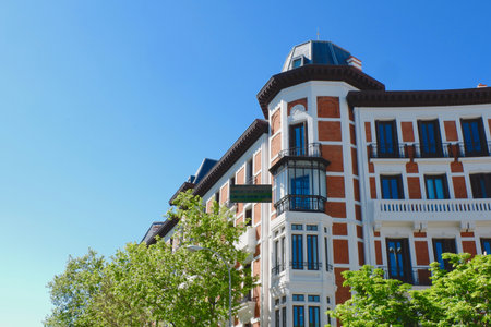 Corner of vibrant modernist building with metallic balconies in Chueca district downtown Madrid, Spain.の写真素材