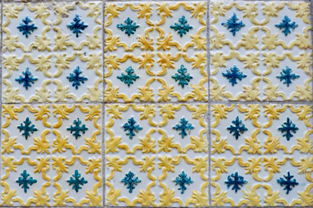 Elegant ceramic tiles on the wall outside on the streets of Porto, Portugal. Photo for backdrops and...