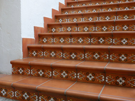 Authentic traditional stairs decorated with elegant rustic tiles in Bielsa, Huesca, Spain.の写真素材