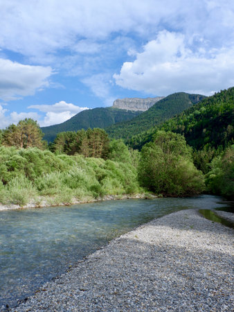 Peaceful mountain landscape with Barrosa river during summertime on the Spanish side of Pyrenees mountain range, Spain.の写真素材