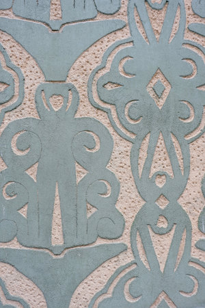 Vintage stucco ornate of pastel green colour on the wall of the building in Fuencarral district, Madrid, Spain.の写真素材