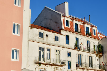 Classical vintage facades downtown at sunset Lisbon, Alfama district, Portugal.の写真素材