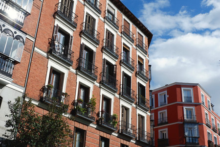 Traditional housing buildings in Chueca district in Madrid, Spain.の写真素材